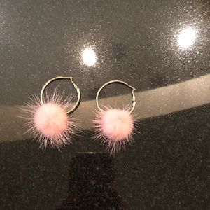 Mignonne Gavigan hoop earrings with pink poof